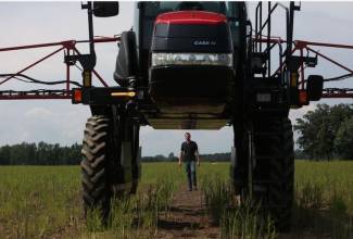 Ontario asparagus grower Mike Chromczak is pictured with his sprayer. 