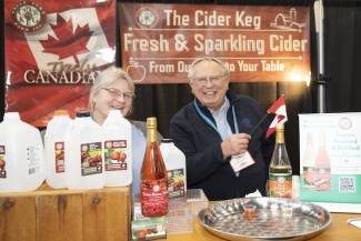 The Cider Keg, Vanessa, Ontario produces sparkling ciders that have broad distribution across southern Ontario. Here, Tom Haskett and his assistant showcase their wares at the 2025 Ontario Fruit and Vegetable Convention.