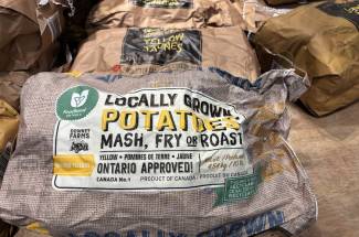 Paper packaging is common for potatoes because light causes greening.