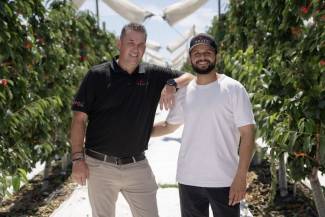 Andre Bailey (L), CEO, Global Fruit and one of the growers. Photo by Chris Stenberg. 