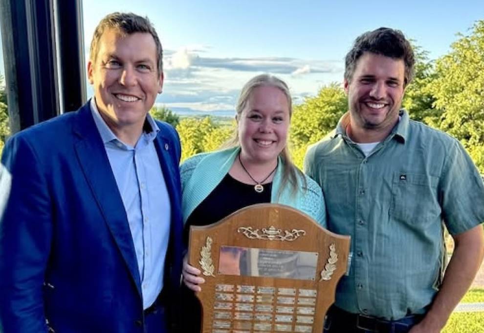 Kody Blois (L), MP Kings-Hants, congratulates Katie Campbell and William Spurr on winning Atlantic Canada’s 2025 Outstanding Young Farmers’ competition.