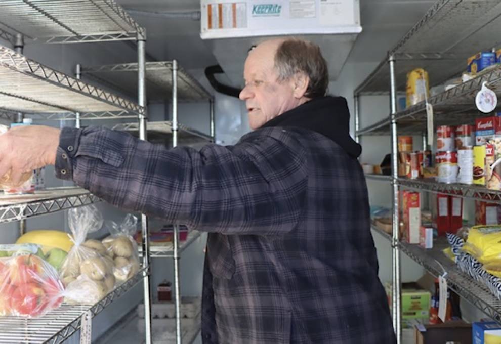 Larry Leckie, volunteer, at Petrolia Community Refrigerator. 
