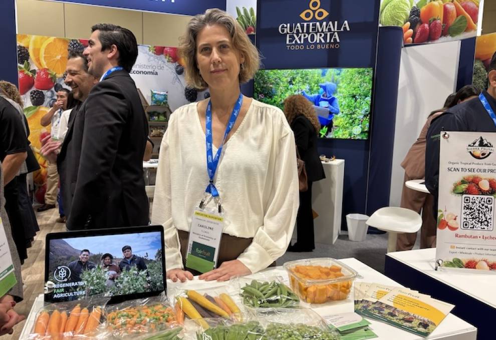 Caroline Floren posed in the Guatemala booth, a first-time exhibitor at the Canadian Produce Marketing Association trade show in April 2026. 