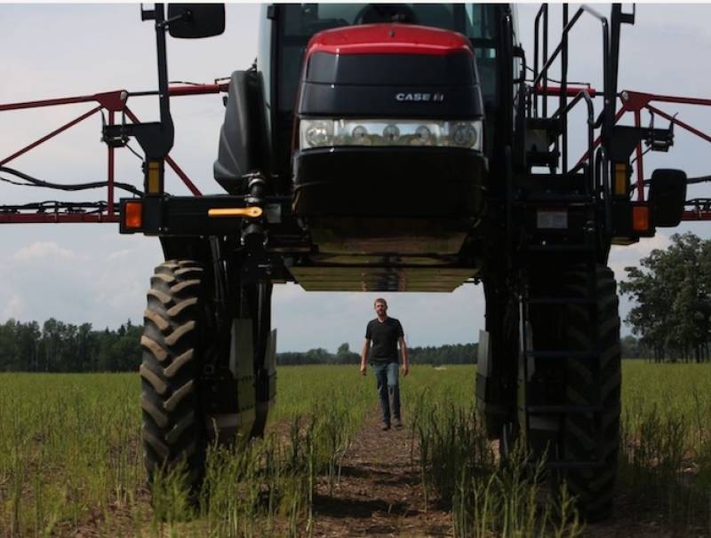 Ontario asparagus grower Mike Chromczak is pictured with his sprayer. 